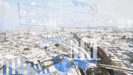 Animation-of-statistical-data-processing-against-aerial-view-of-cityscape-in-winter