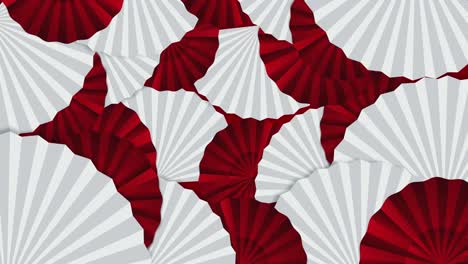 Animation-of-chinese-new-year-fan-pattern-on-red-background
