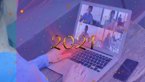 Animation-of-spots-and-2021-text-over-diverse-business-people-having-video-call
