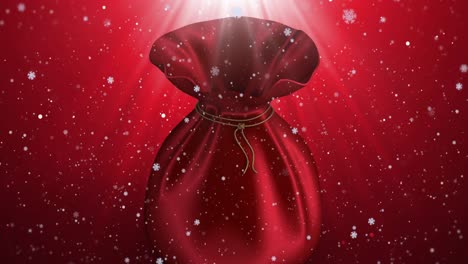 Animation-of-christmas-red-sack-and-snow-falling-in-winter-scenery