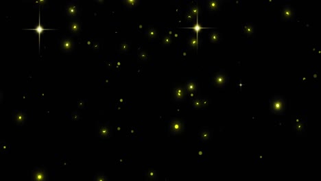 Animation-of-glowing-spots-of-yellow-light-on-black-background