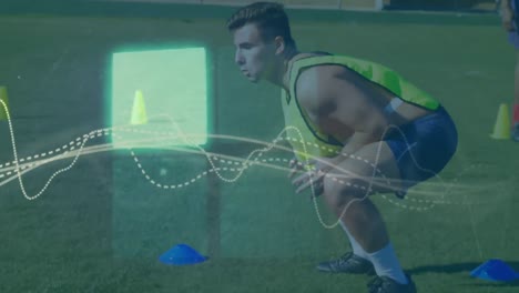 Animation-of-squares-and-graphs-over-caucasian-male-soccer-player-doing-jumping-drills-on-ground