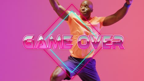 Animation-of-game-over-text-over-neon-pattern-and-african-american-basketball-player