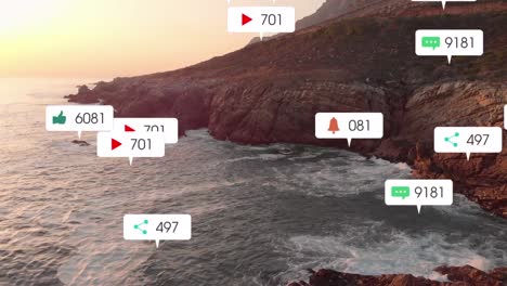Animation-of-social-media-icons-over-sunset-and-sea-landscape