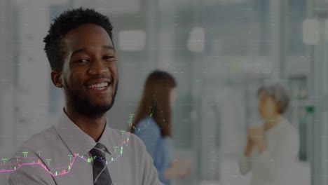 Animation-of-financial-data-processing-over-african-american-businessman-smiling