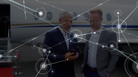 Animation-of-network-of-connections-over-diverse-business-people-at-airport