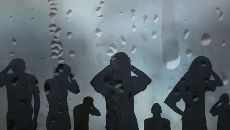 Animation-of-dripping-water-and-lightnings-over-people-silhouettes-holding-heads