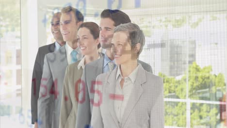 Animation-of-trading-board-over-diverse-smiling-coworkers-standing-in-row-at-office
