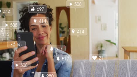 Animation-of-social-media-icons-and-data-processing-over-biracial-woman-using-smartphone