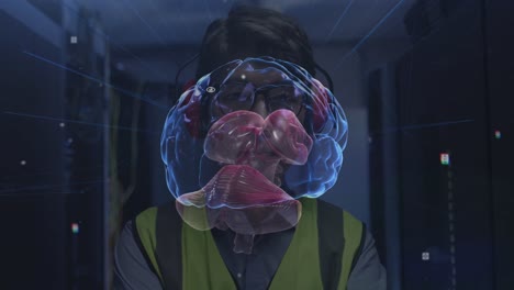 Animation-Von-Verbindungen-Und-Digitalem-Gehirn-über-Einem-Asiatischen-Mann-Im-Serverraum