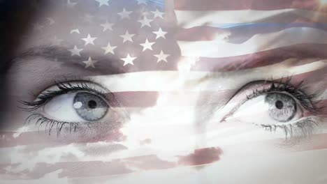 Animation-of-flag-of-usa-and-sky-with-clouds-over-eyes-of-caucasian-woman