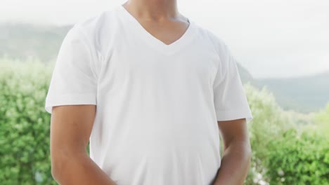 Slow-motion-video-of-african-american-man-wearing-white-t-shirt-with-copy-space