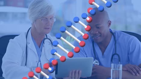 Animation-of-dna-strand-over-diverse-doctors-using-tablet