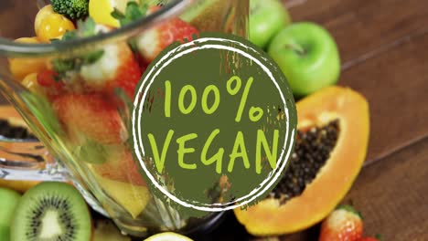 Video-of-100-percent-vegan-text-over-fresh-fruit