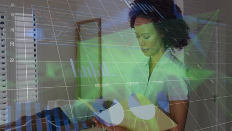 Animation-of-financial-data-processing-over-african-american-female-doctor-taking-notes