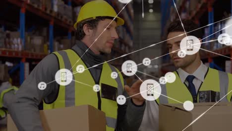 Animation-of-network-of-connections-with-icons-over-diverse-men-working-in-warehouse