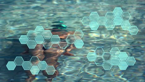 Animation-of-data-processing-over-caucasian-woman-swimming