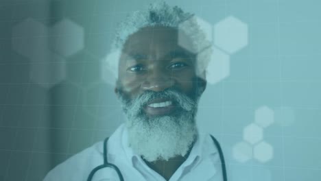 Animation-of-african-american-male-doctor-and-data-processing-over-blue-background