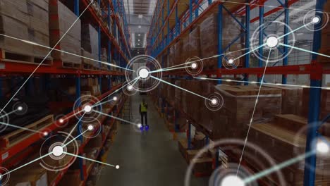 Animation-of-network-of-connections-with-spots-over-african-american-man-working-in-warehouse