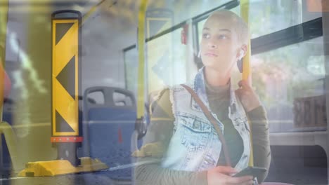 Animation-of-cars-on-street-over-biracial-woman-using-smartphone-in-bus
