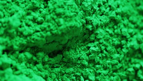 Video-of-close-up-of-green-powder-with-copy-space