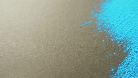 Video-of-blue-coloured-powders-with-copy-space-on-black-background
