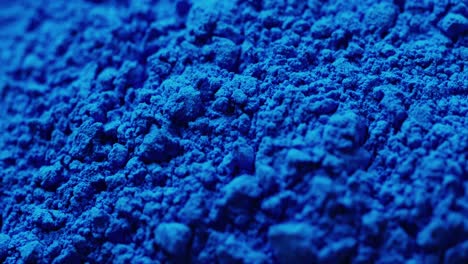 Video-of-close-up-of-blue-powder-with-copy-space