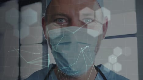 Animation-of-data-processing-over-caucasian-male-doctor-in-face-mask