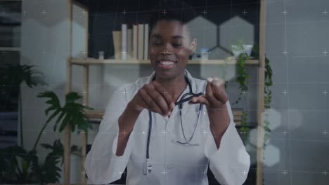 Animation-of-data-processing-over-smiling-african-american-female-doctor-talking