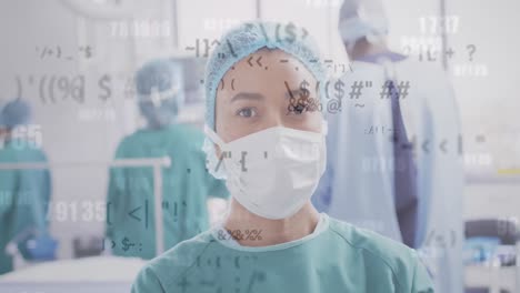 Animation-of-medical-data-processing-over-biracial-female-surgeon-in-face-mask