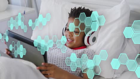 Animation-of-medical-data-processing-over-biracial-boy-patient-in-bed