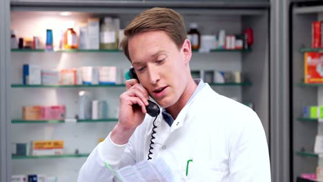 Handsome-pharmacist-on-the-phone