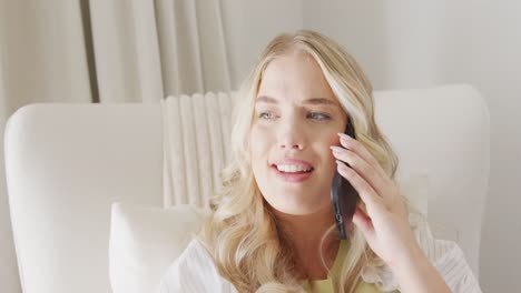 Happy-caucasian-plus-size-woman-talking-on-smartphone-in-slow-motion