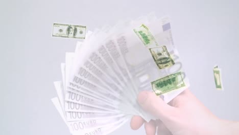 Animation-of-american-dollar-banknotes-falling-over-hand-waving-euro-banknotes