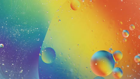 Animation-of-bubbles-moving-on-blue-and-yellow-liquid-with-copy-space