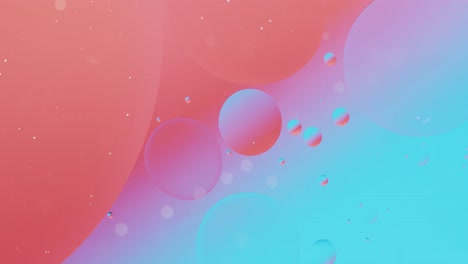 Animation-of-bubbles-moving-on-red-and-blue-background-with-copy-space