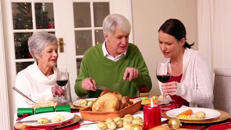 Family-having-christmas-dinner-together