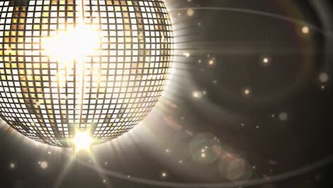 Animation-of-spinning-disco-mirror-ball-on-black-background