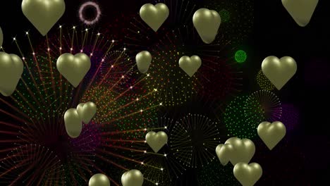 Animation-of-gold-hearts-over-fireworks-on-black-background
