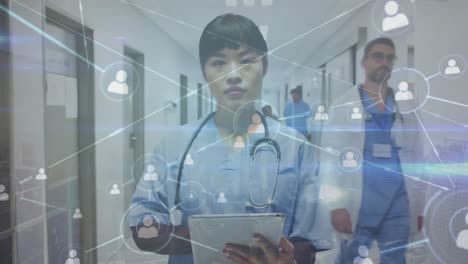Animation-of-network-of-connections-over-asian-female-doctor-in-hospital