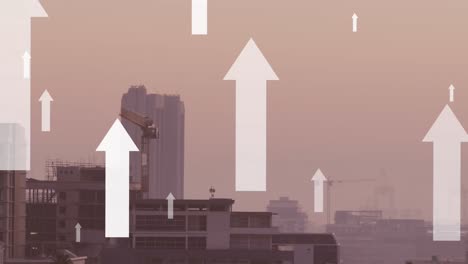 Animation-of-multiple-arrow-icons-moving-upwards-against-aerial-view-of-cityscape
