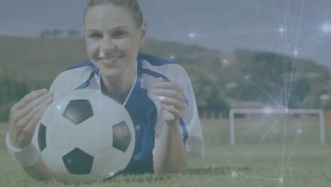 Animation-of-network-of-connections-over-caucasian-female-football-player-with-football-on-pitch