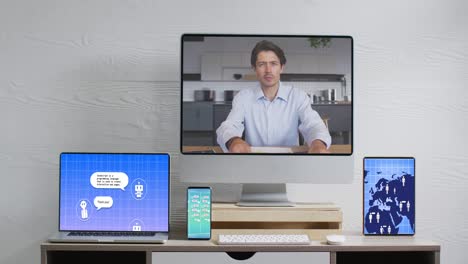 Composition-of-caucasian-man-on-computer-screen,-electronic-devices-with-ai-chat-on-screens