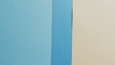 Close-up-of-blank-and-blue-cards-with-copy-space-in-slow-motion