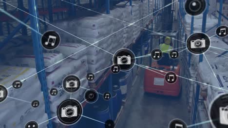 Animation-of-network-of-icons-over-rear-view-of-a-male-worker-operating-a-forklift-at-warehouse