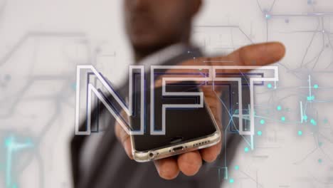 Animation-of-nft-text,-connected-dots-on-navigation-pattern,-african-american-man-with-cellphone
