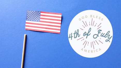 Animation-of-4th-of-july-text-over-flag-of-united-states-of-america-on-blue-background