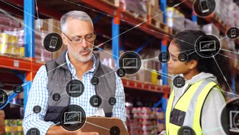 Animation-of-digital-icons-on-diverse-male-supervisor-and-female-worker-discussing-at-warehouse