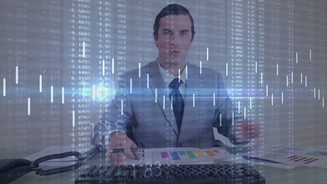 Animation-of-data-processing-and-light-spot-against-caucasian-businessman-using-computer-at-office