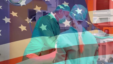 Animation-of-flag-of-usa-over-diverse-surgeons-in-hospital-theatre